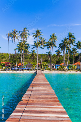 Wooden pathway.  Tropical Resort. boardwalk on beach