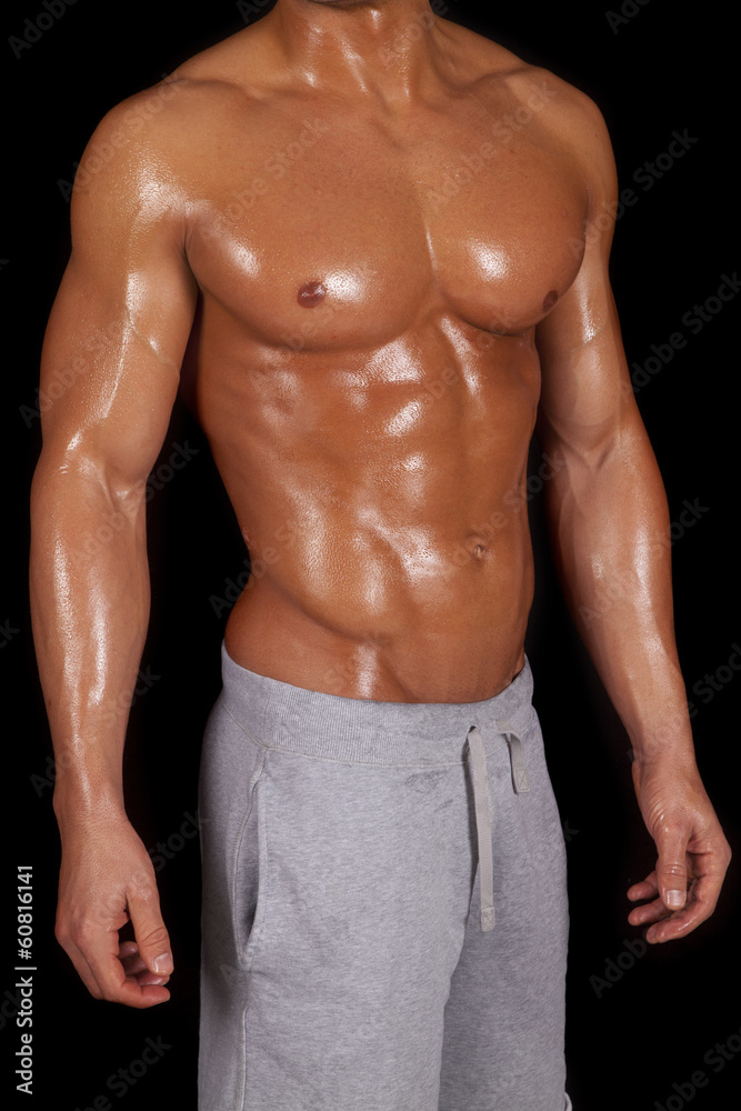 Fototapeta premium man no shirt shiny body strong