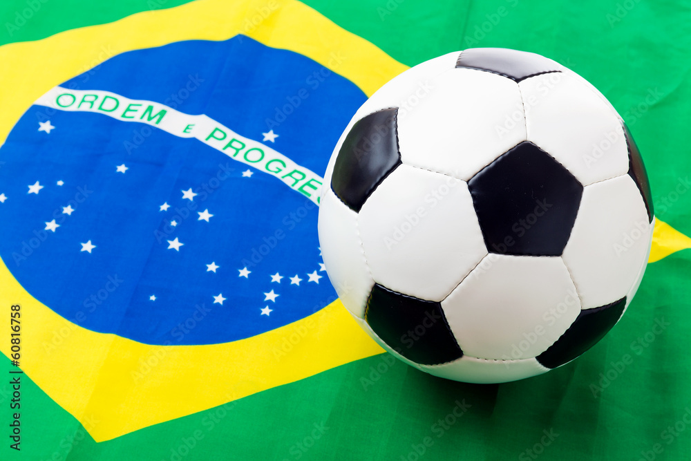 Naklejka premium Brazil Flag and soccer ball
