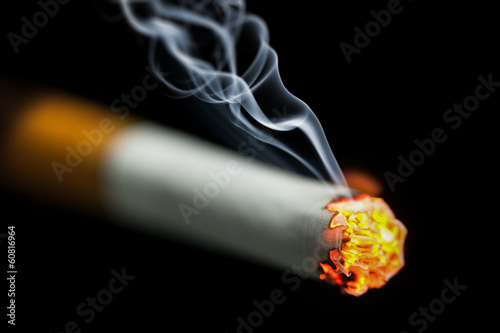 burning cigarette with smoke