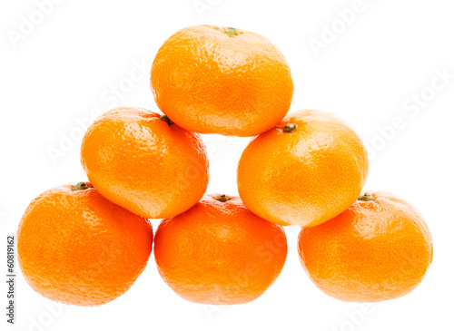 Stacked Fresh Mandarin Isolated On White Background.