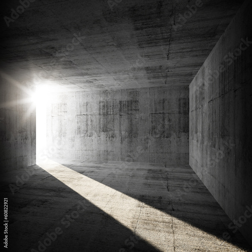 Abstract empty dark concrete interior with sunlight beam