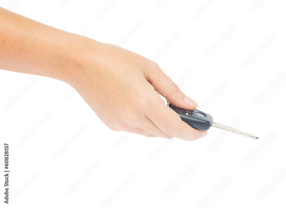 hand holding remote car key hand holding remote car key