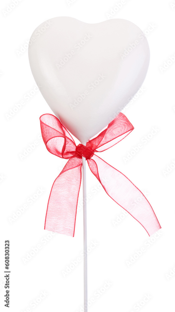 White heart and red ribbon with a bow Isolated on white backgrou