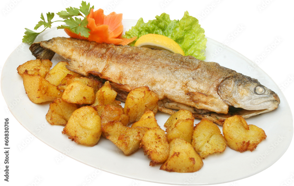 Grilled fish on BBQ with potatoes and vegetables Grilled fish on BBQ with potatoes and vegetables