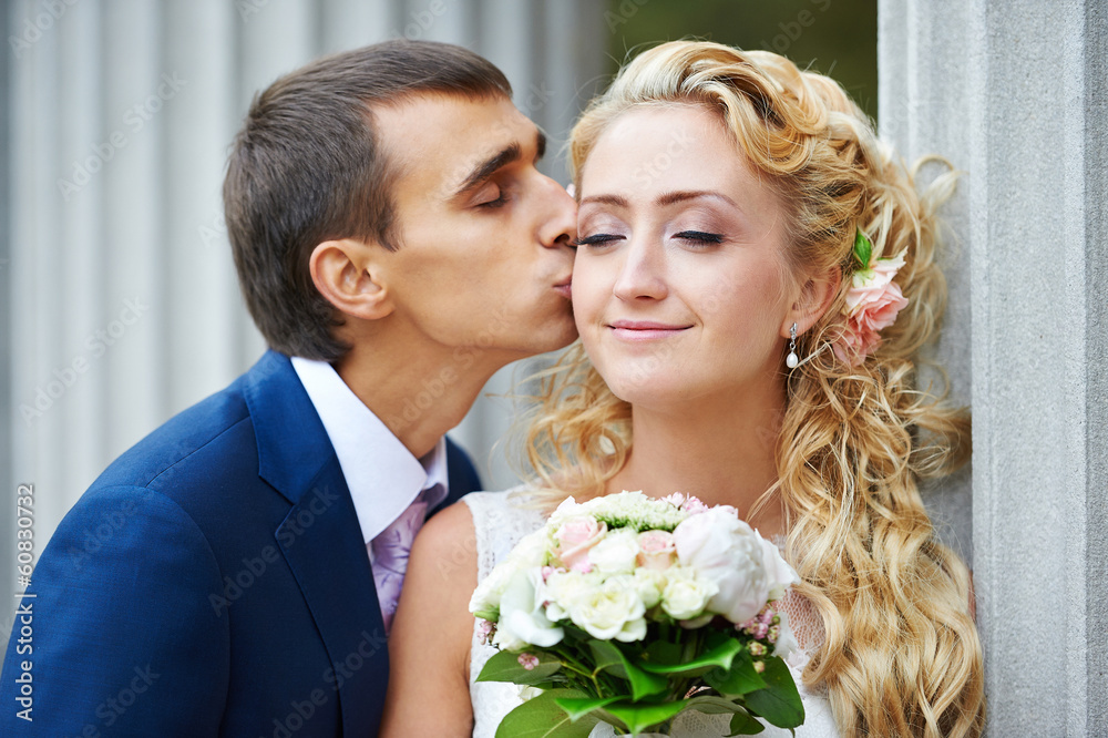 Romantic kiss happy bride and groom Romantic kiss happy bride and groom
