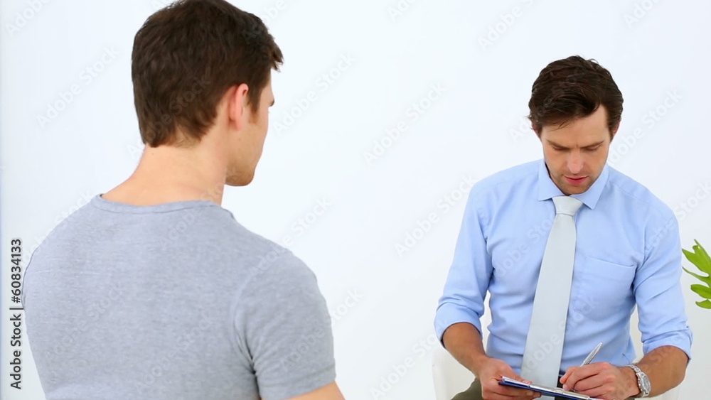 Physiotherapist talking with patient Physiotherapist talking with patient