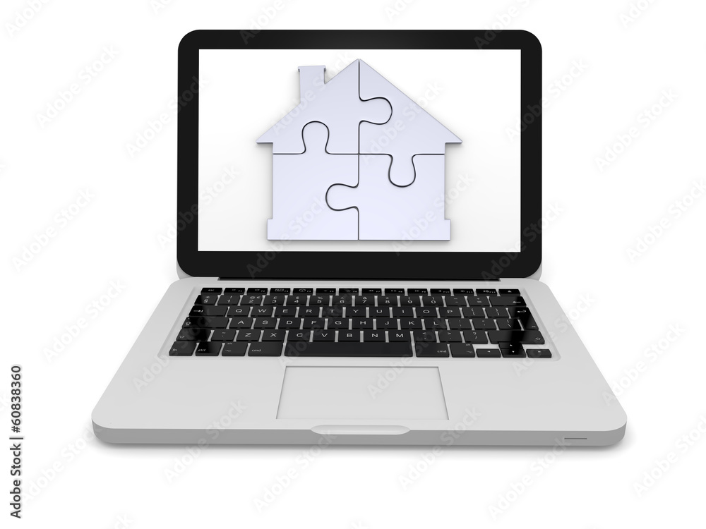 Home jigsaw on laptop screen Home jigsaw on laptop screen