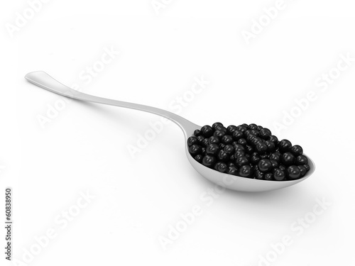 Black Caviar in Spoon isolated on white background