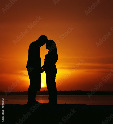 silhouette of a man and women fell in love