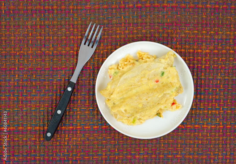 Small serving of chicken enchiladas with fork Small serving of chicken enchiladas with fork
