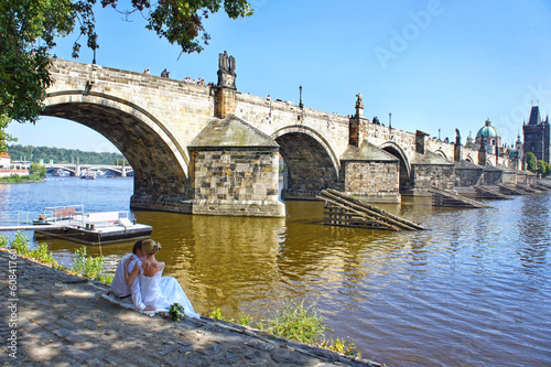 Photography Wedding couple on the waterside of the Vltava River