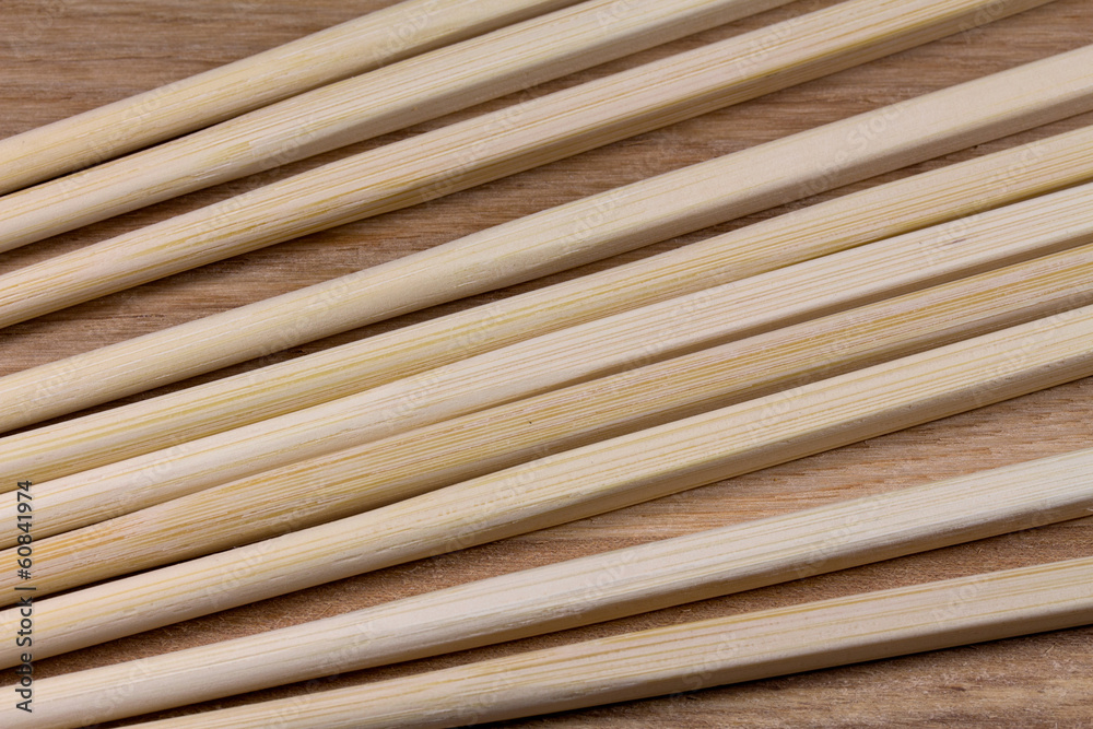 Chopsticks on a wooden surface Chopsticks on a wooden surface