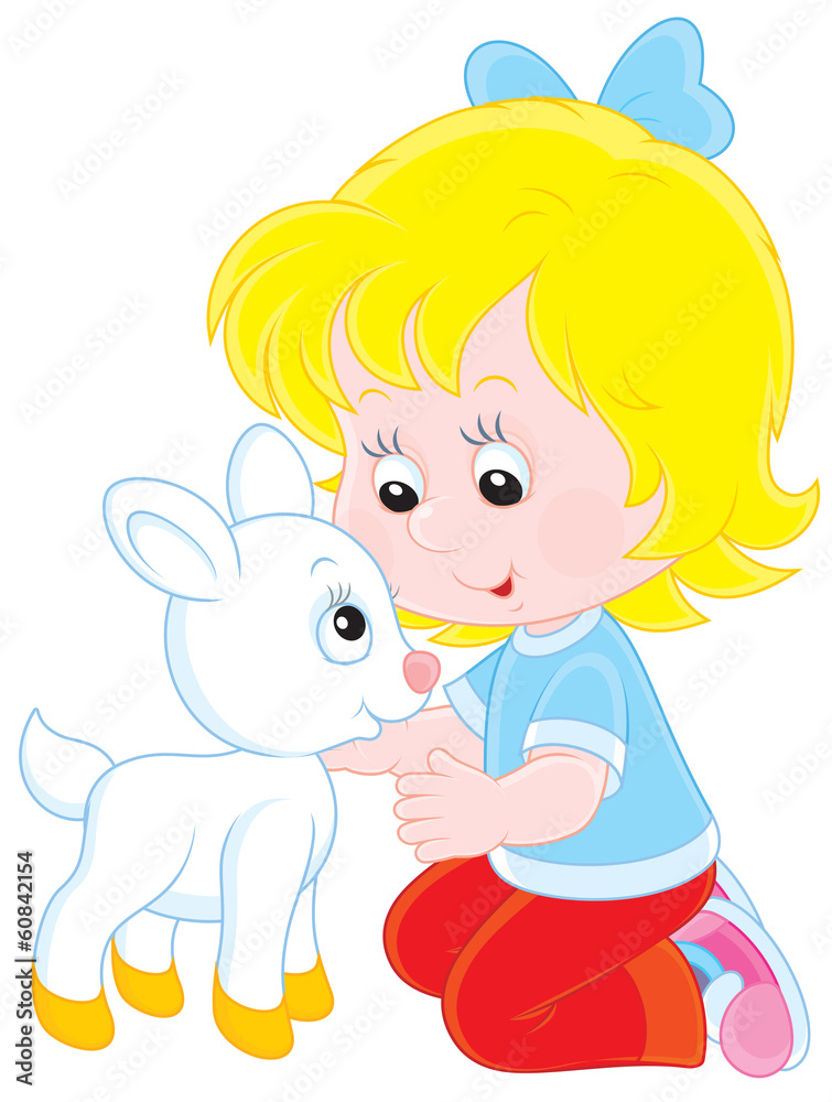 Little girl caresses a small white goatling
