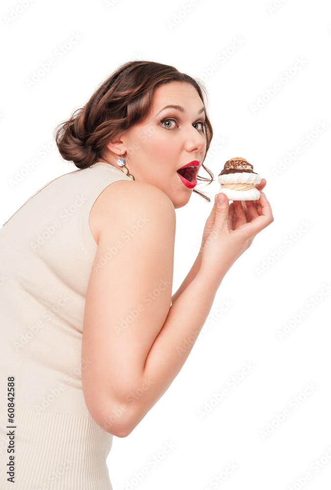 Beautiful plus size woman eating pastr Beautiful plus size woman eating pastr
