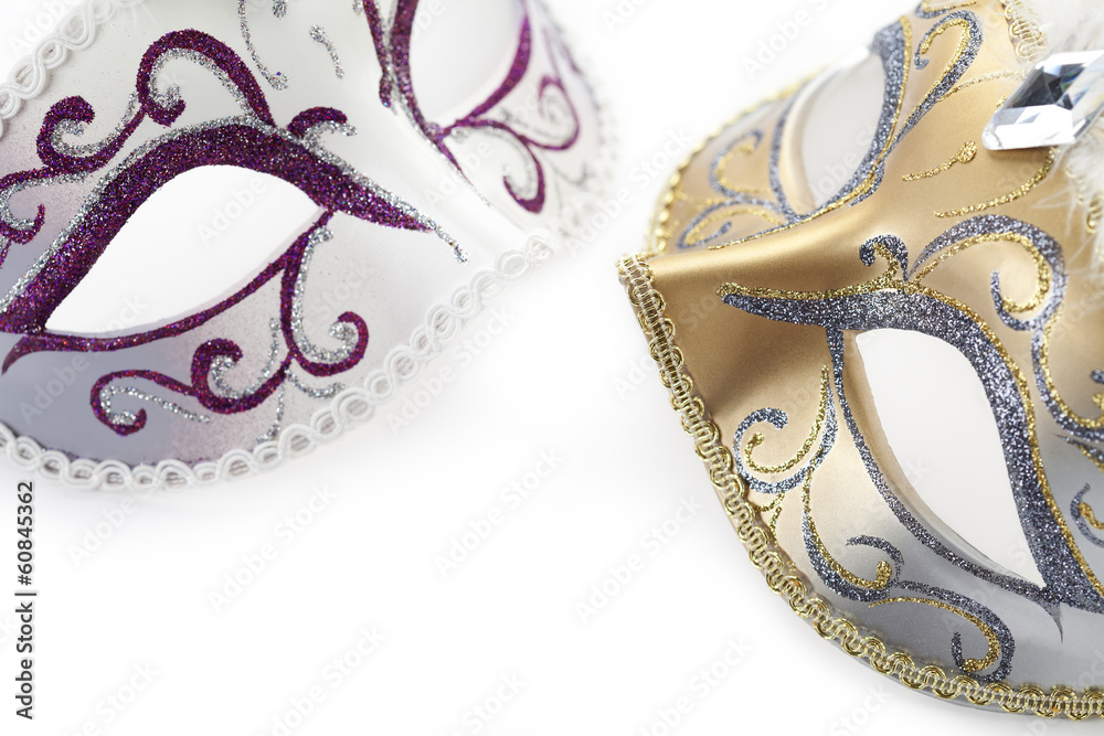 Two carnival masks on white background Two carnival masks on white background