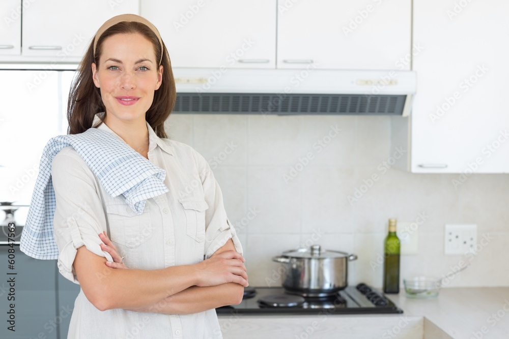 Portrait of a confident smiling woman in kitchen Portrait of a confident smiling woman in kitchen