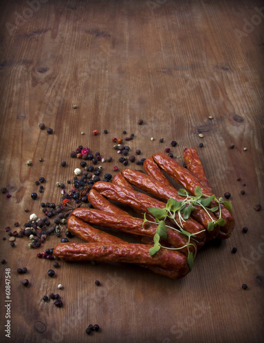 pepper sausages on wood