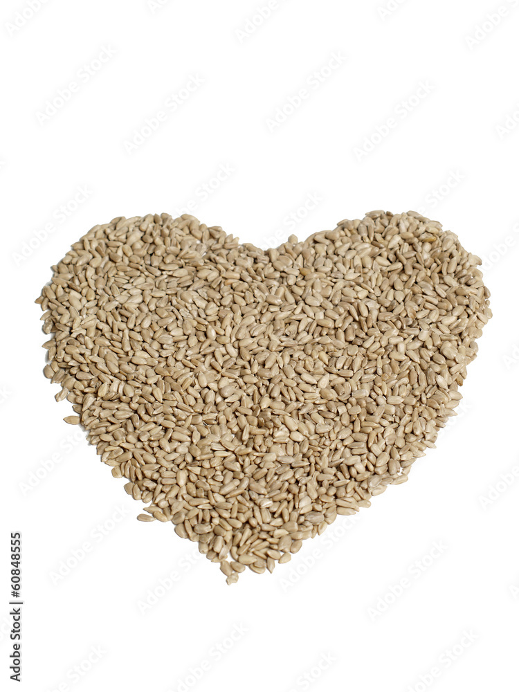 Sunflower seeds creating a heart shape Sunflower seeds creating a heart shape