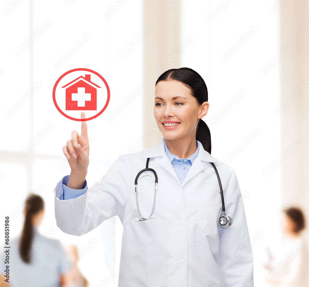 smiling female doctor pointing to something smiling female doctor pointing to something
