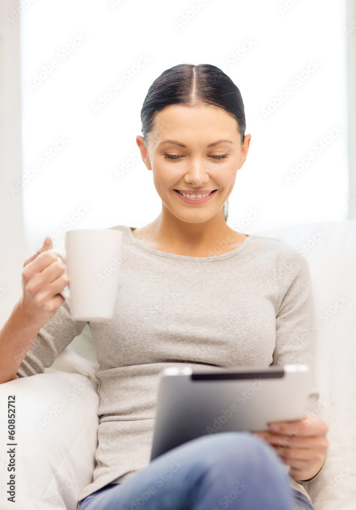 smiling woman with tablet pc computer and cup smiling woman with tablet pc computer and cup