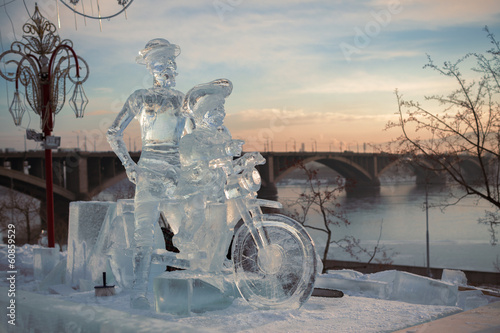 Don Quixote and it squire on a bicycle, a sculpture from ice