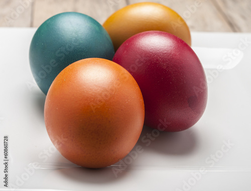 Bright and cheerful Easter still life with rainbow color eggs