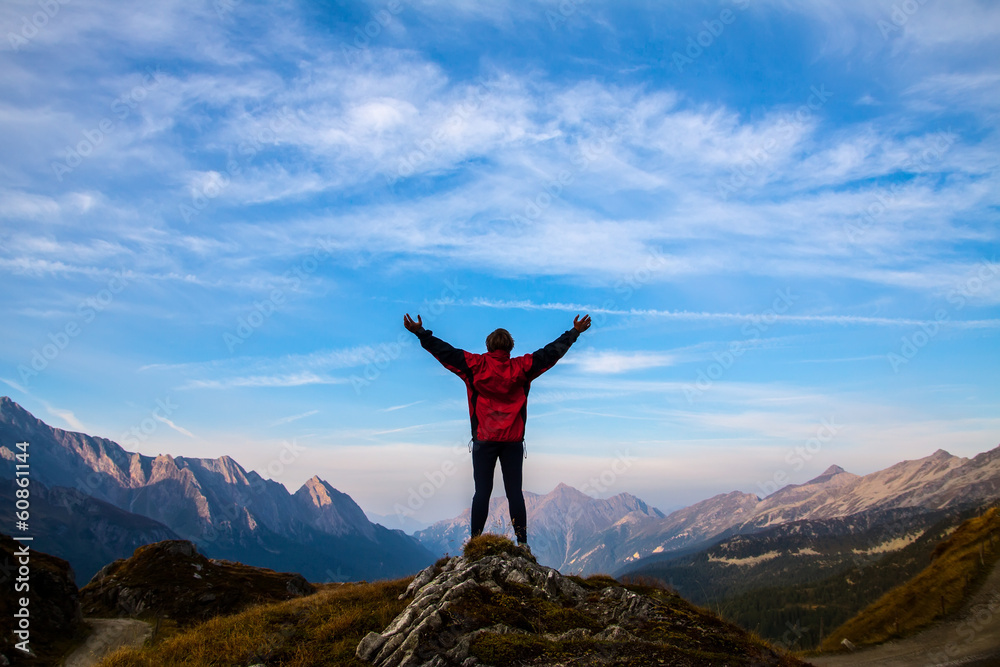 women silhouette on the top of mountain