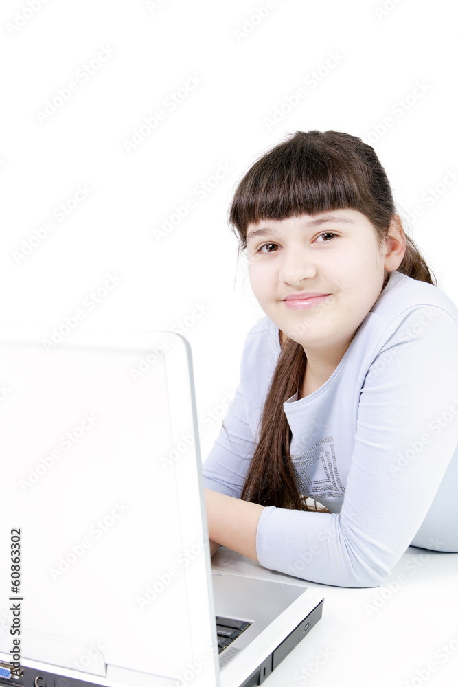 Teen girl learns lessons on an isolated white background Teen girl learns lessons on an isolated white background