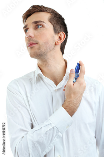 Handsome young man using pe...