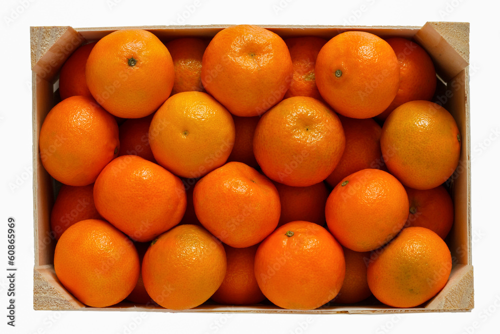 Wooden box filled with tangerines