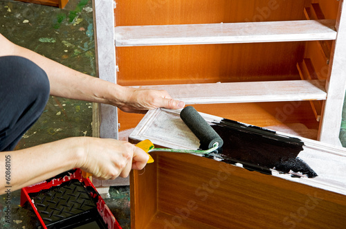 painter with paint roller photo