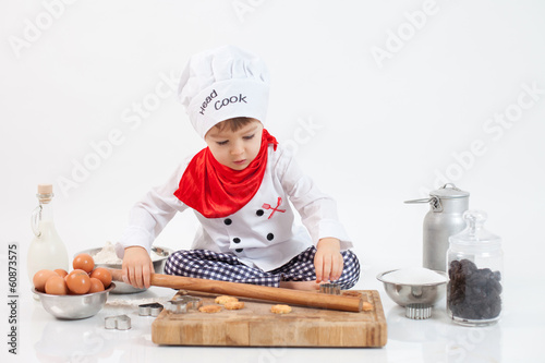 Little boy, preparing cookies