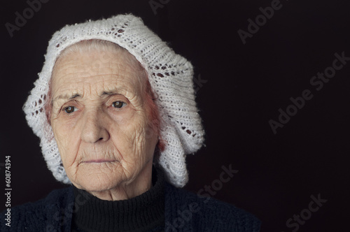 Portrait of a sad old woman