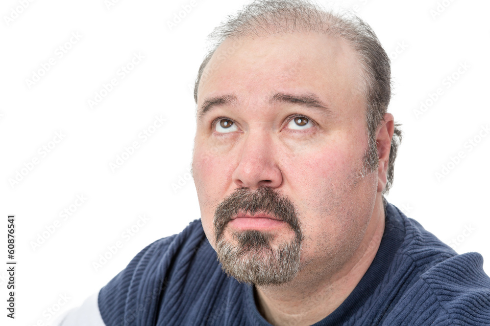 Close-up portrait of a mature man thinking Close-up portrait of a mature man thinking