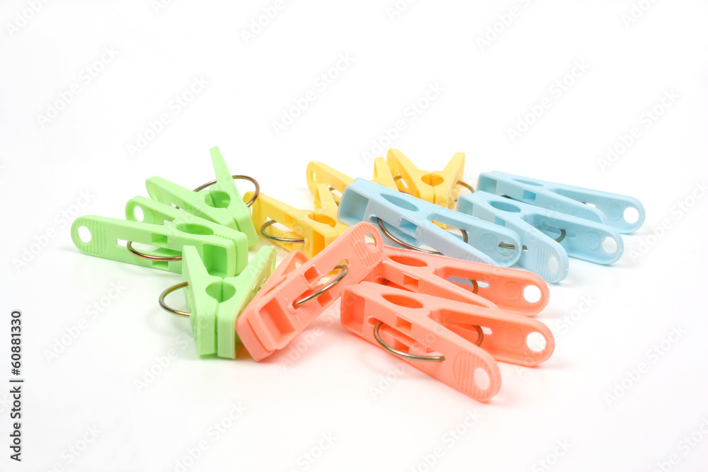 Color clothes-pegs over white Color clothes-pegs over white