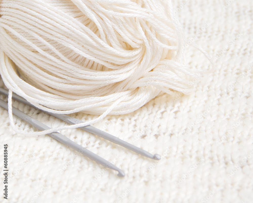 Yarn and crochet hook background Yarn and crochet hook background