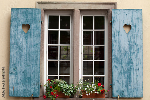 Fototapeta Naklejka Na Ścianę i Meble -  Window of a house in Eguisheim, Alsace, France