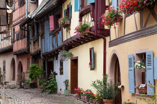 Street with half-timbered medieval houses in Eguisheim © wjarek