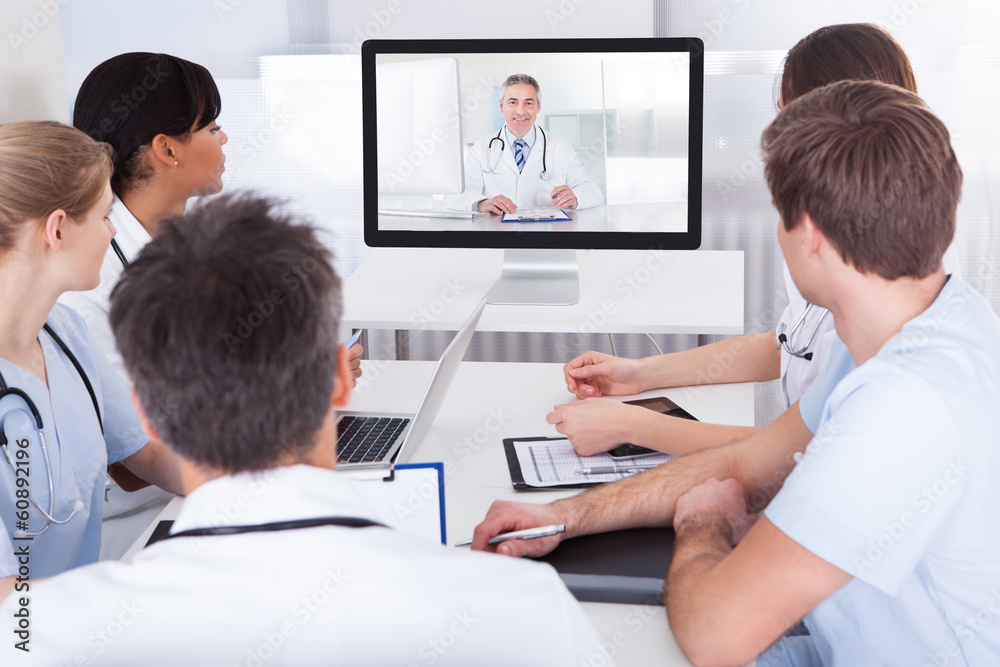Fototapeta premium Doctors Watching Online Presentation