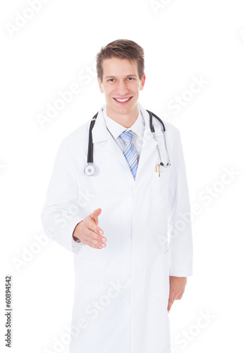 Young Male Doctor Offering Handshake