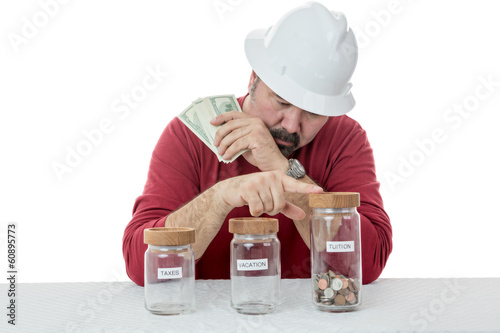 Construction worker decides over the use of money