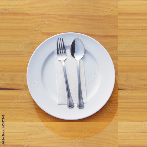 Fork and spoon and plate