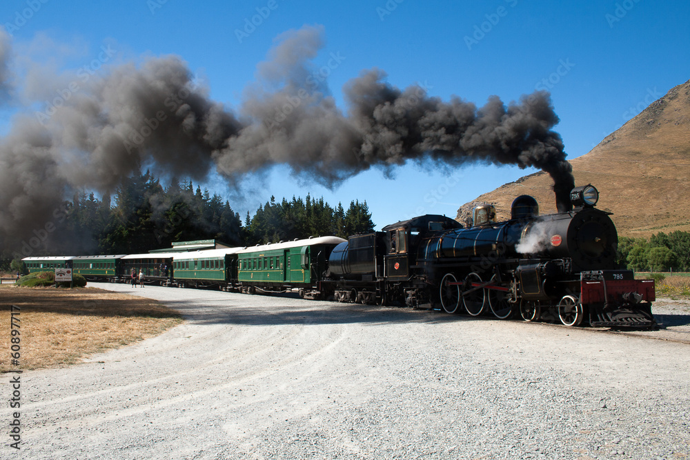 Obraz premium A vintage steam train departure in New Zealand outback