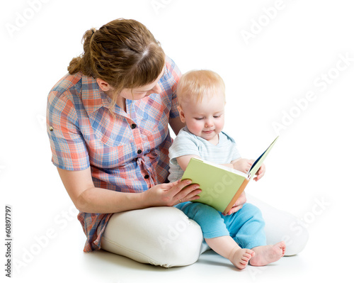 mother reading a book to he...