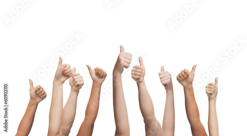 human hands showing thumbs up