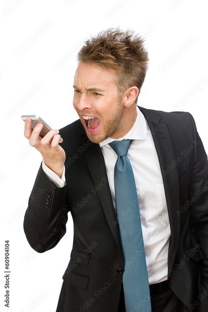 Half-length portrait of businessman shouting at cell phone Half-length portrait of businessman shouting at cell phone