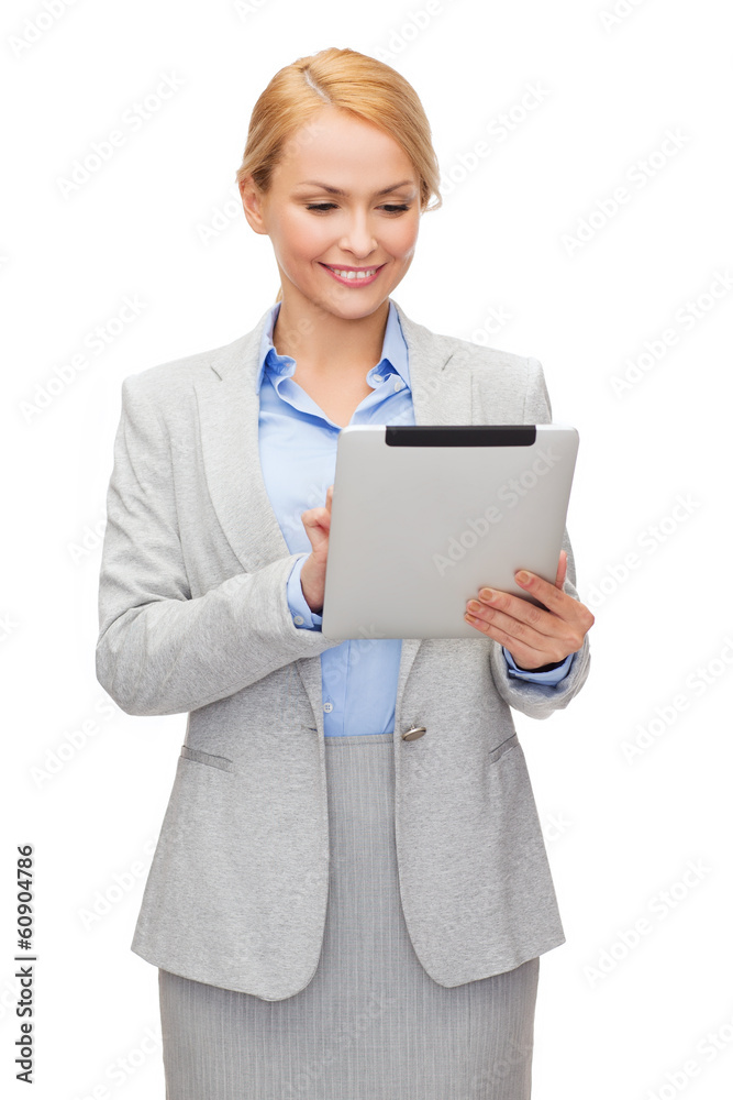smiling woman looking at tablet pc smiling woman looking at tablet pc
