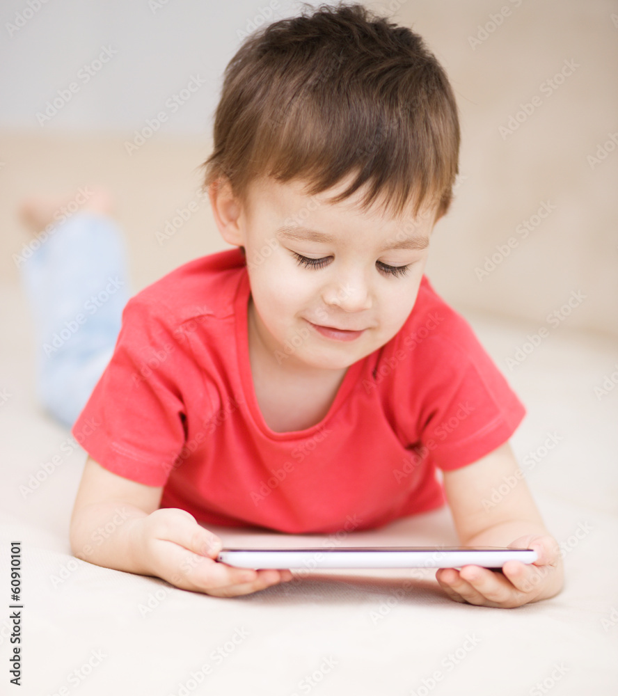 Boy using tablet Boy using tablet