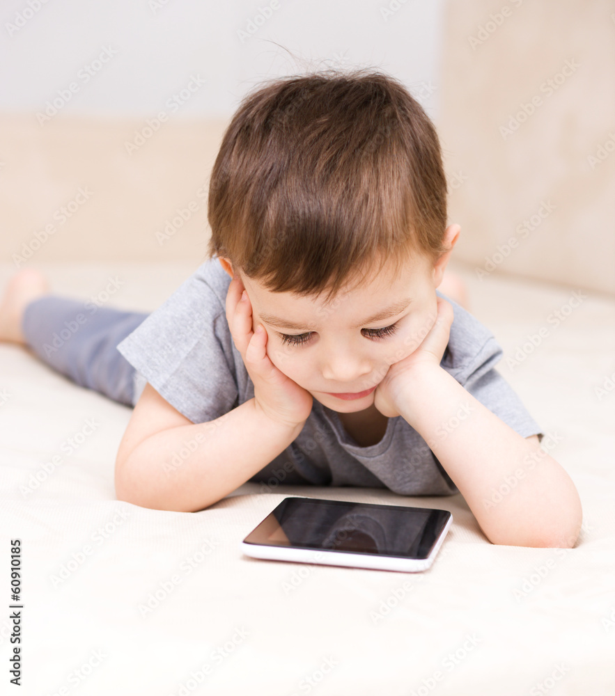 Boy using tablet Boy using tablet
